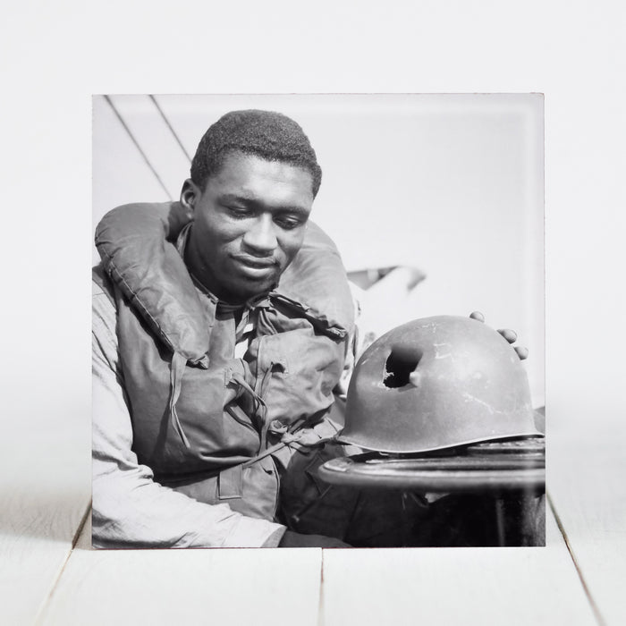 Coast Guardsman with Shrapnel damaged Helmet WW2
