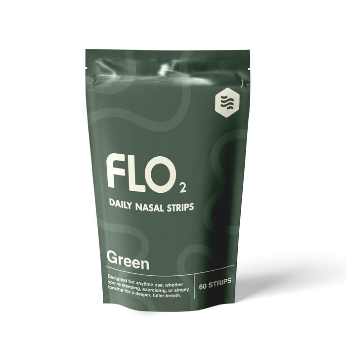 Green package of FLO2 daily nasal strips on a white background