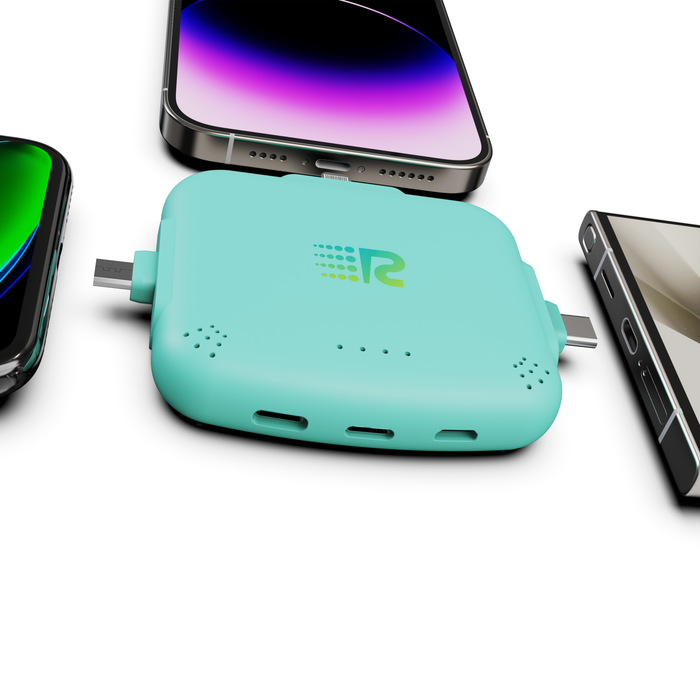 Mint green portable charger with smartphone and tablet on a white background